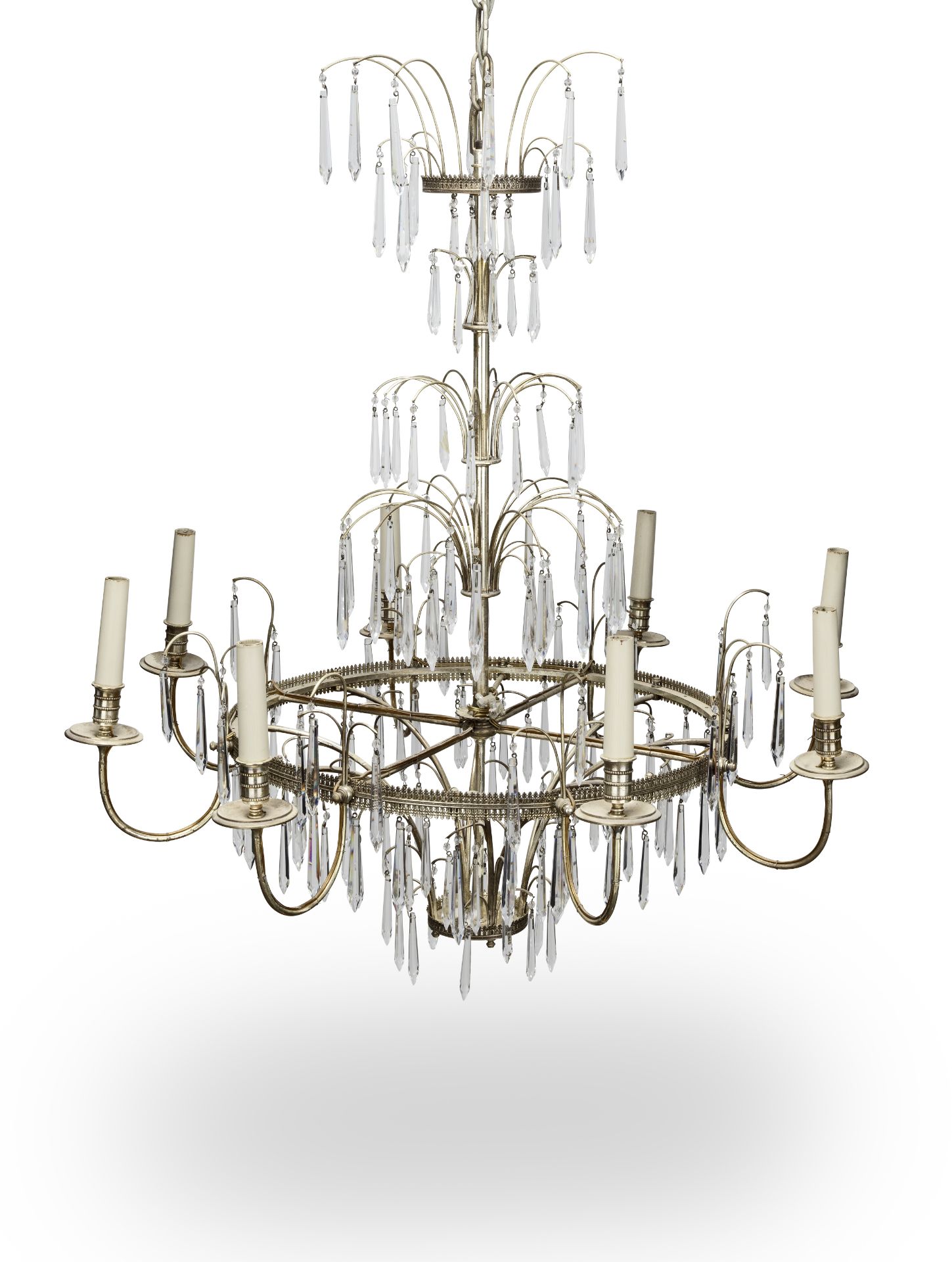 A late 19th/early 20th century silvered metal and cut glass eight light chandelier probably Italian