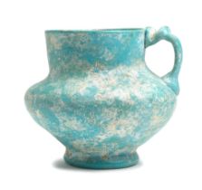 An opaque turquoise glass jug Persia or Egypt, 11th/ 12th Century