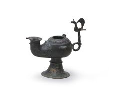 A Khorasan bronze oil lamp Persia, 12th Century