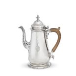 A George II silver coffee pot with no visible maker's mark, London 1747