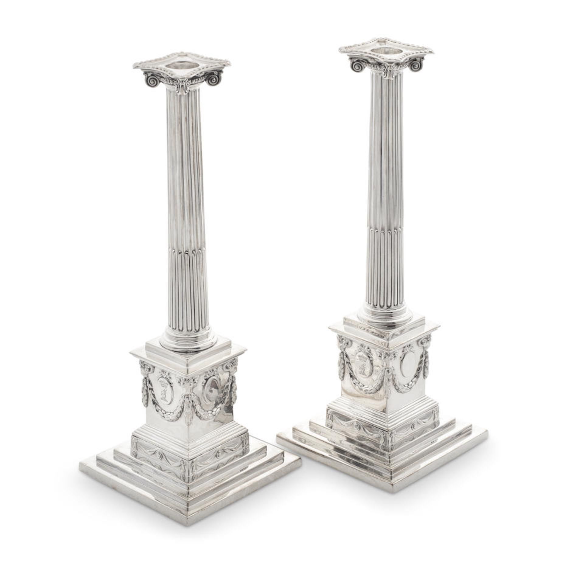 A rare pair of George III silver Neo Classical candlesticks John Carter, London 1772 (2)