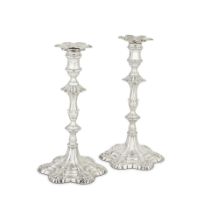 A pair of George III cast silver candlesticks Ebenezer Coker, London 1764 (2)