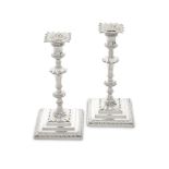 A pair of George III cast silver candlesticks William Cafe, London 1764 (2)