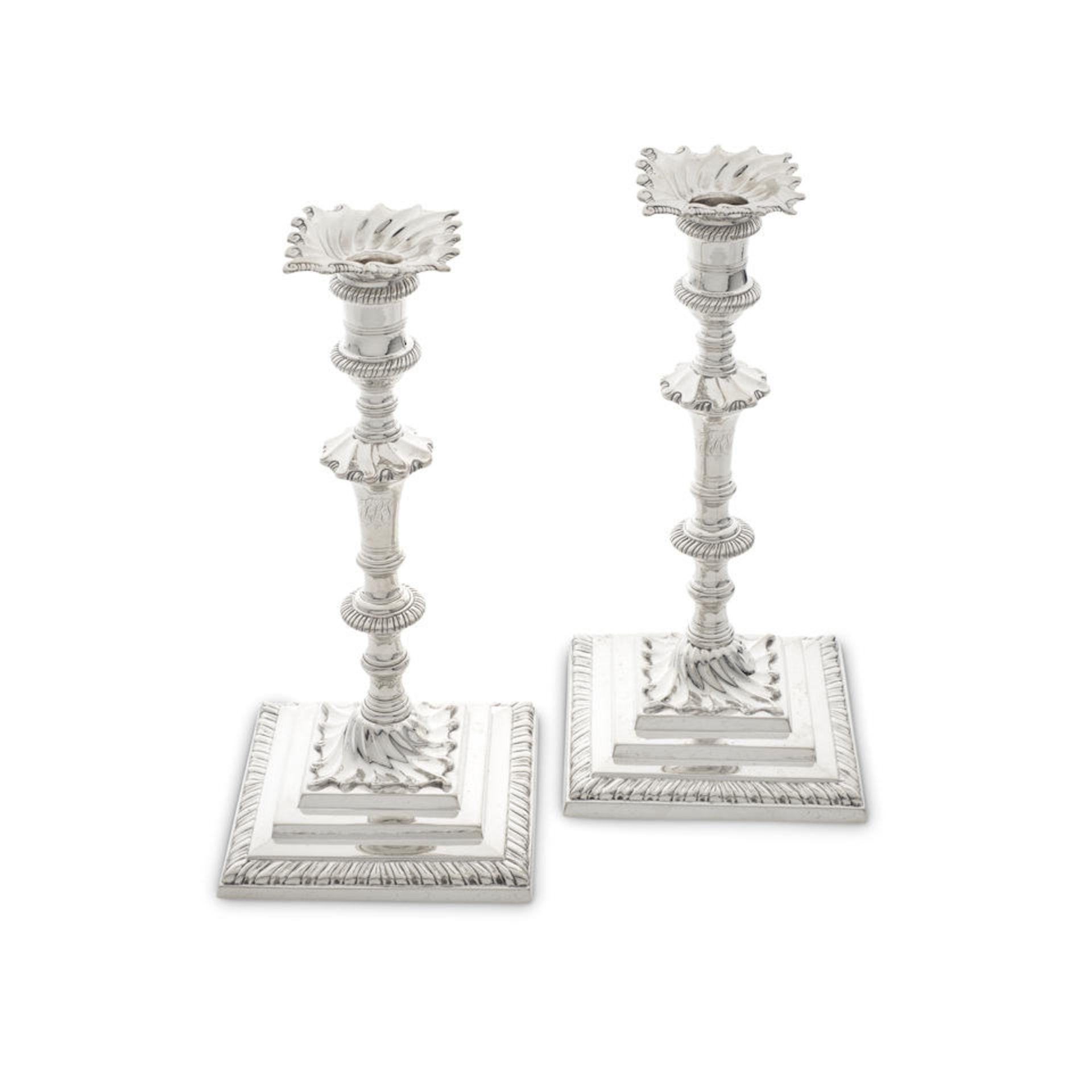 A pair of George III cast silver candlesticks William Cafe, London 1764 (2)