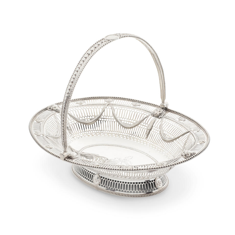 A George III pierced silver swing-handled bread / cake basket Burrage Davenport, London 1780