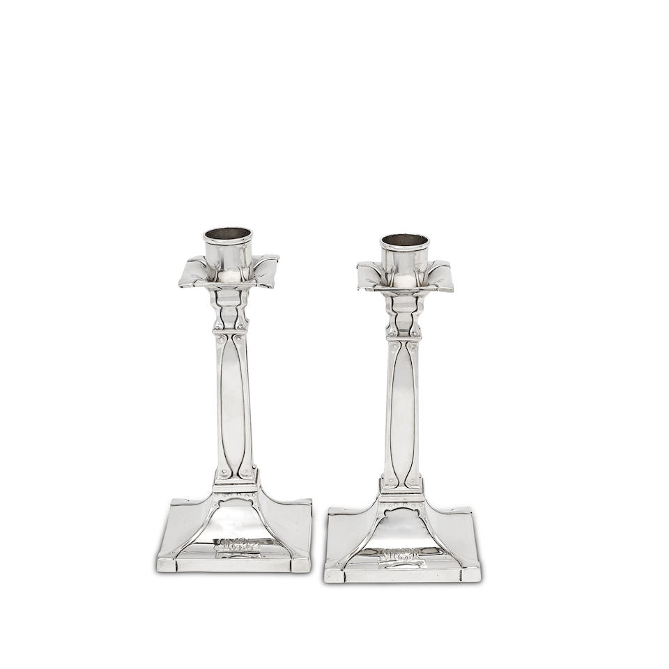 A pair of Arts and Crafts silver candlesticks Pearce & Sons, Sheffield 1906 (2)