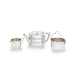 A three-piece silver plated tea service after a design by Christopher Dresser Henry Wilkinson, ...