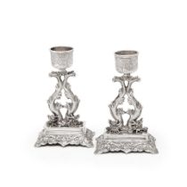 A pair of Chinese export silver dwarf candlesticks Hung Chong, stamped HC and character mark, ci...