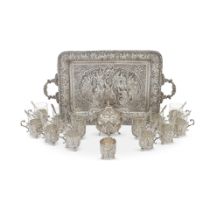 A silver two-handled tray with twelve tea cups, twelve spoons and a covered bowl Iranian, 20th c...