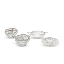 Three German silver pierced bowls late 19th / early 20th century together with a German silver t...