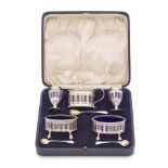 A cased silver five-piece condiment set R Comyns, London 1926 and Charles & Richard Comyns, Lond...