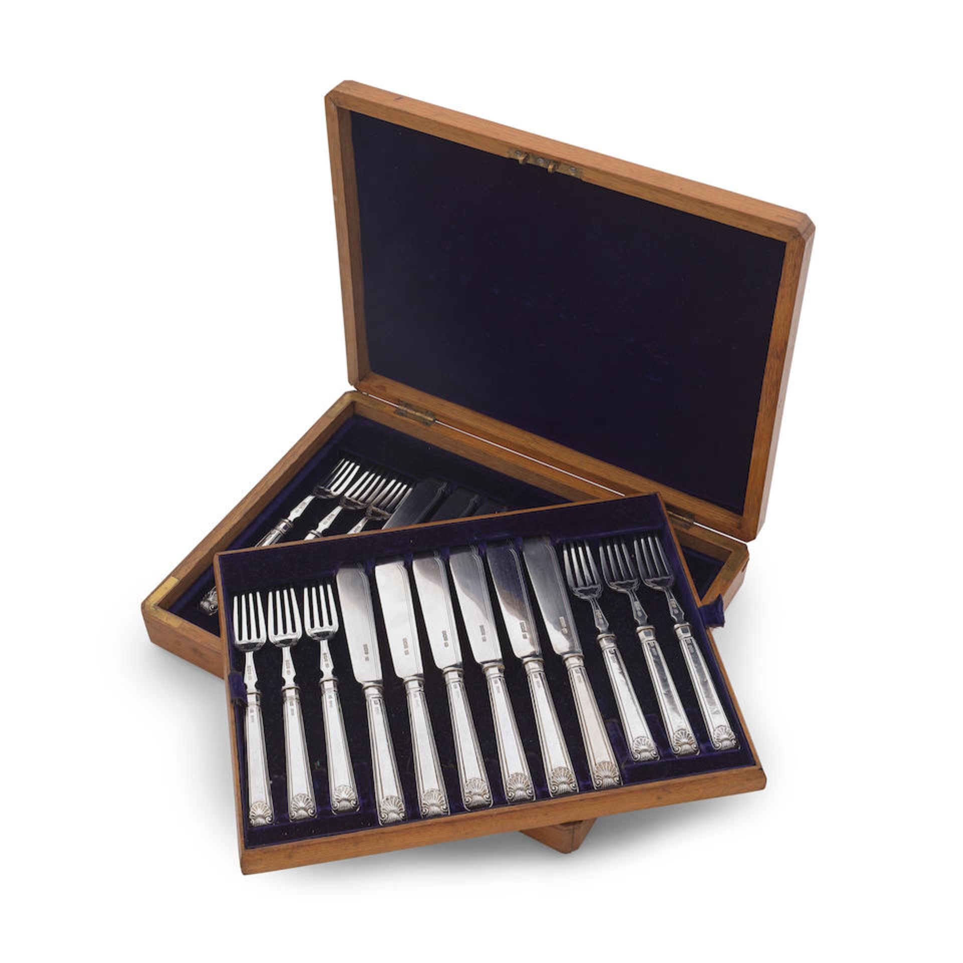 Twelve pairs of Edwardian silver fish knives and forks, cased Harrison Brothers & Howson, Sheffi...