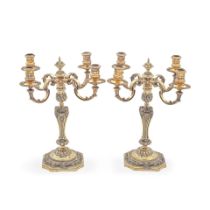 A pair of 18th century style cast silver-gilt four-light candelabra, after Paul de Lamerie C J V...