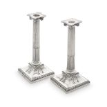 A pair of George III silver candlesticks Samuel Roberts, Sheffield 1773, first year of assay off...