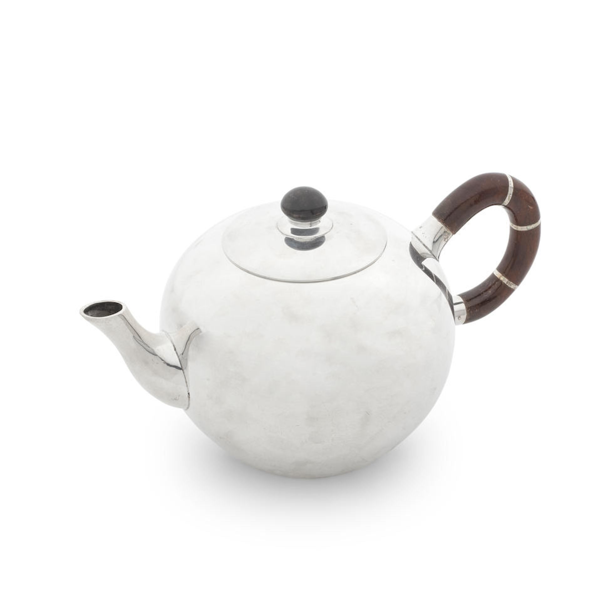 An American silver teapot Tiffany & Co, also stamped STERLING SILVER and numbered 25747, 20th ce...