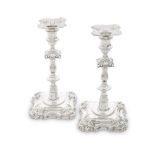 A pair of George III cast silver candlesticks John Carter, London 1775 (2)