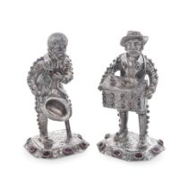 A pair of German silver figures Importers mark for Elly Isaac Miller and import marks for London...