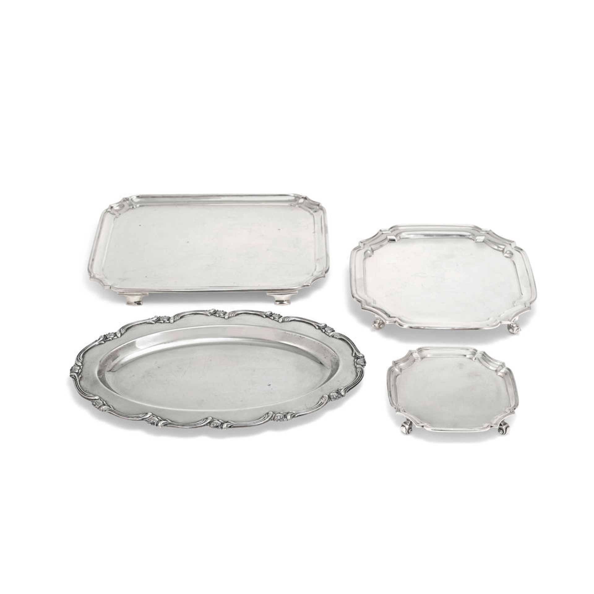 Four silver salvers / trays Charles Stuart Harris & Sons, London 1934; A Chick & Sons Ltd, Sheff...