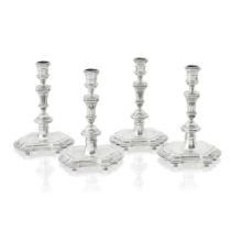 A matched set of four 18th century Dutch cast silver candlesticks Three with maker's mark for Wi...