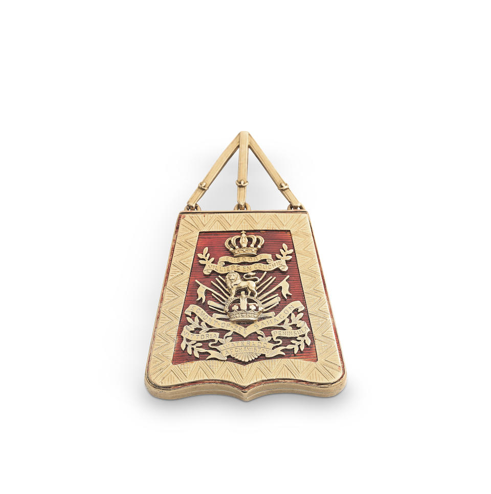 REGIMENTAL INTEREST: a late 19th / early 20th century gold and enamelled novelty compact, modell...