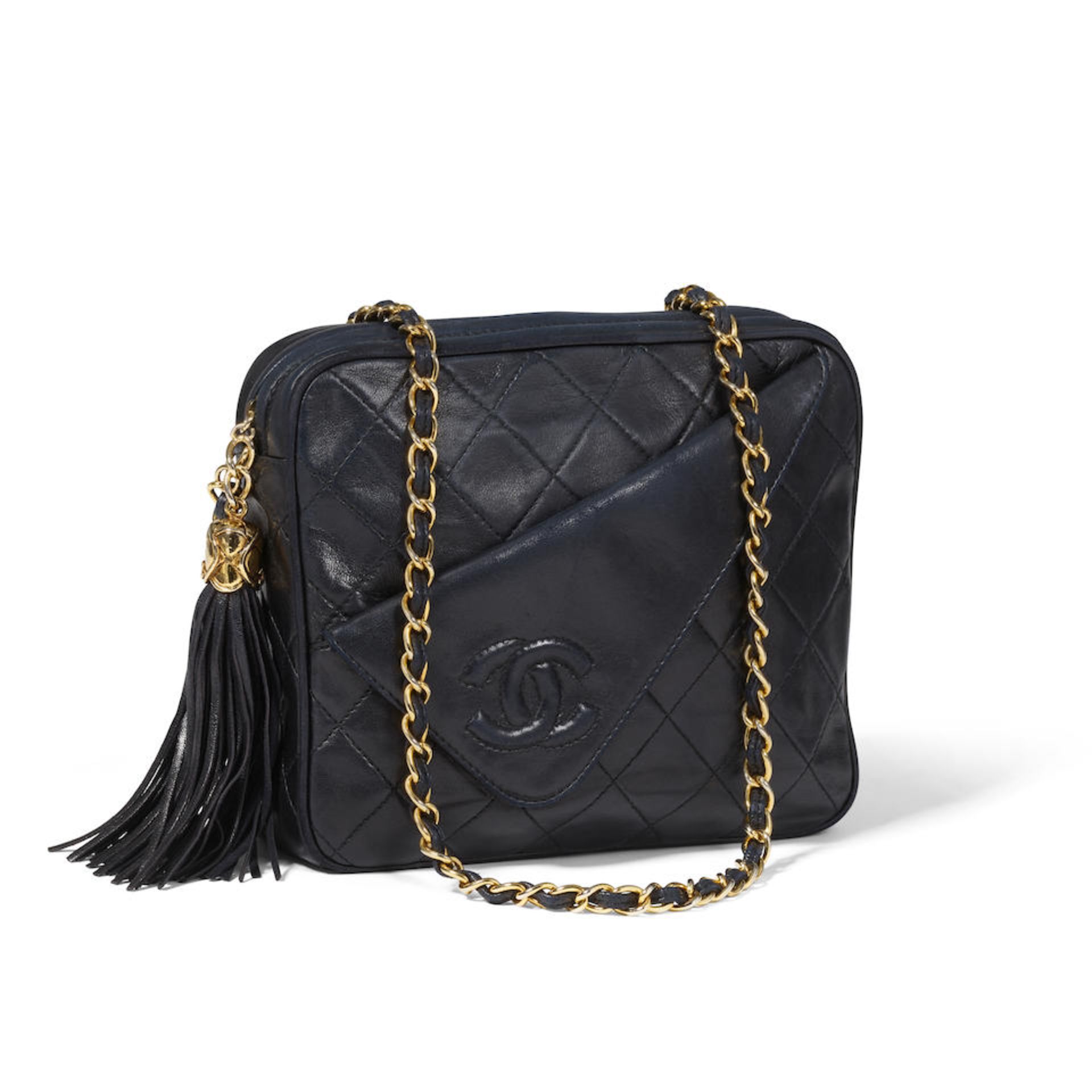 CHANEL: QUILTED TASSEL CAMERA BAG 1989-1991
