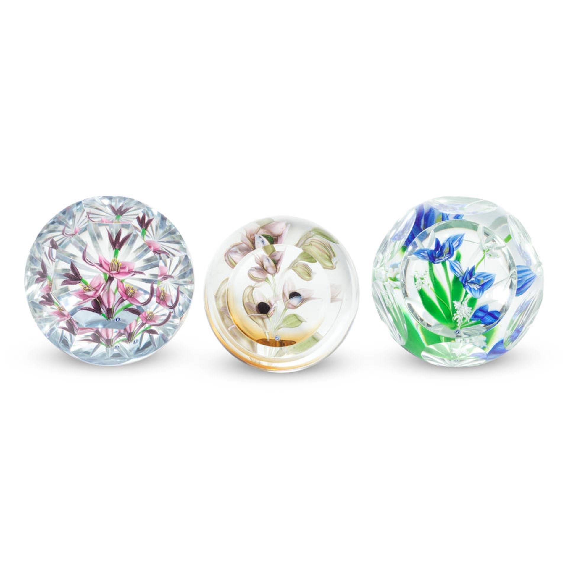 Three Caithness / Whitefriars upright botanical paperweights and three floral bouquet weights by...