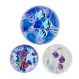 Three Lundberg Studios 'Tropical Tidepool' paperweights by Daniel Salazar, dated 1995, 2005 and ...