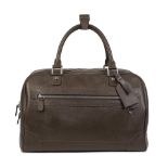 Louis Vuitton: a Brown Taiga Leather Stanislav Travel Bag 2007 (includes luggage tag and handle ...