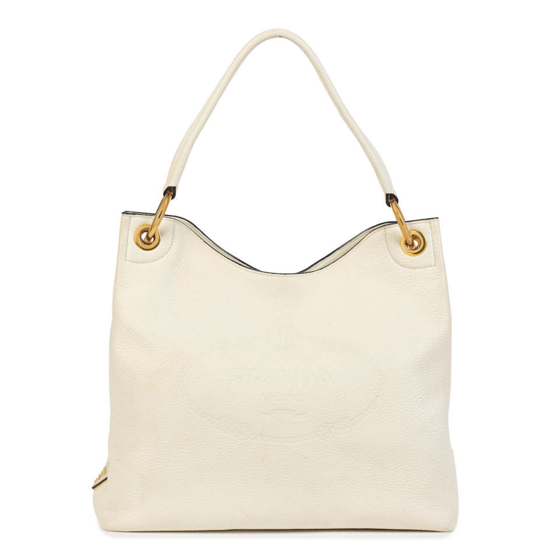 Prada: a White Vitello Daino Leather Embossed Shoulder Bag (includes authenticity card and dust ...