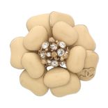 Chanel: a Beige Camellia Enamelled Pin Brooch Autumn 2010