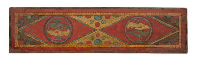 A CARVED AND PAINTED WOOD SUTRA COVER TIBET, CIRCA 1200