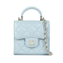 Virginie Viard for Chanel: a Baby Blue Lambskin Mini Clutch with Chain 2022 (includes serial sti...