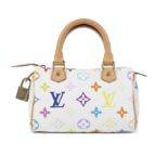 Louis Vuitton x Takashi Murakami: a White Multicolore Monogram Nano Speedy 2004 (includes padloc...