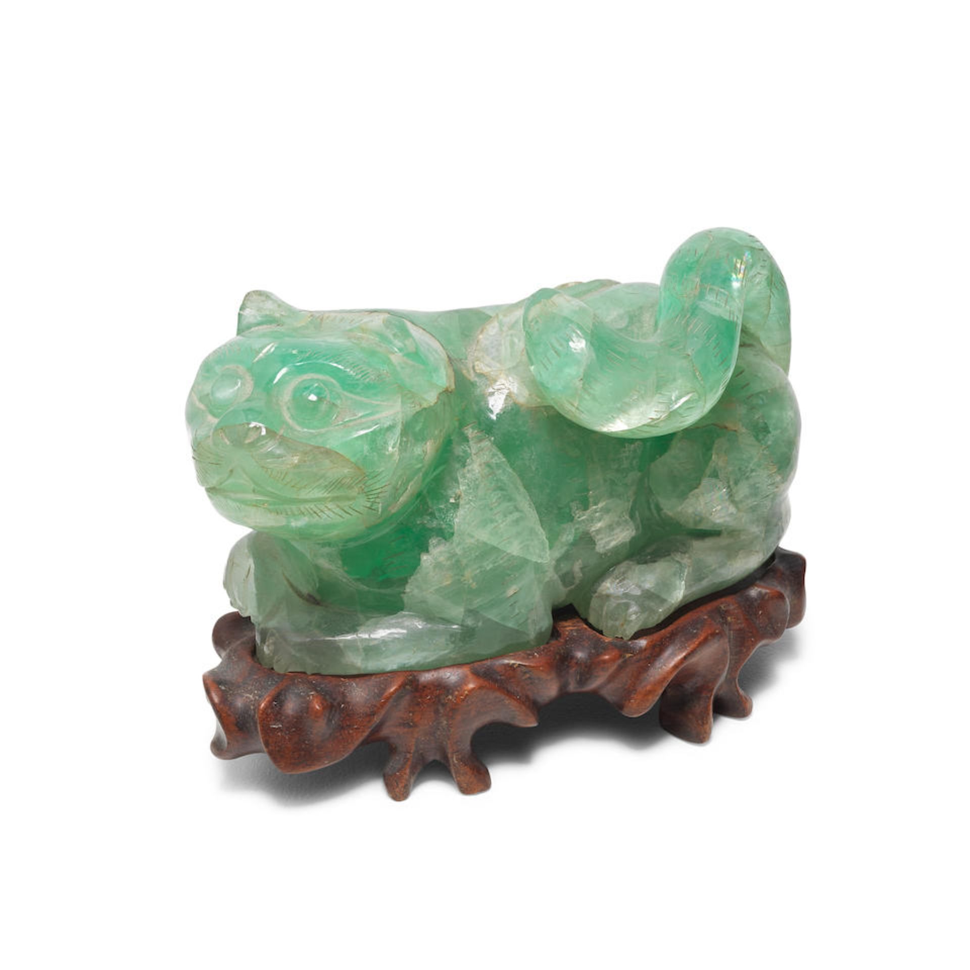 An early 20th century Chinese carved green quartz model of a cat