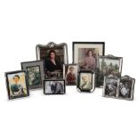 A selection of framed photographs of members of the cast of The Crown in character (9)