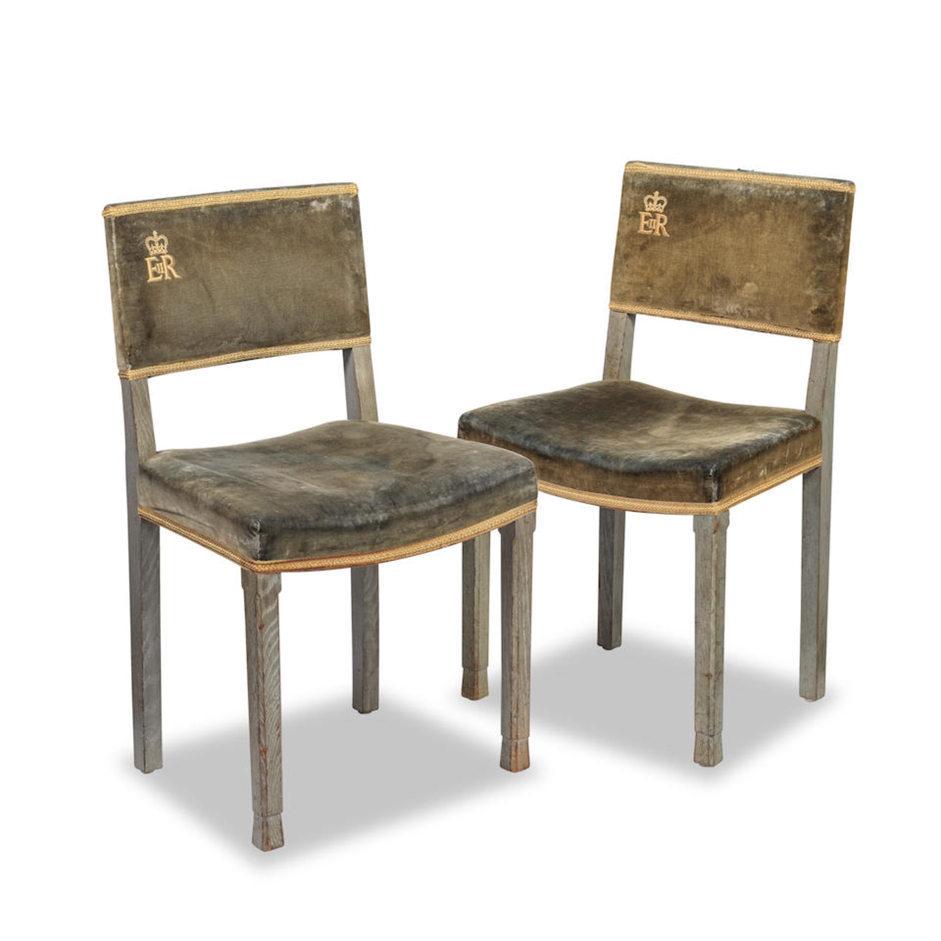 A pair of Queen Elizabeth II limed-oak Coronation chairs, 1953 (2)