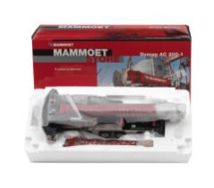 A boxed 1:50 scale die-cast model of a Mammoet Demag AC200-1 industrial crane by Mammoet Store,