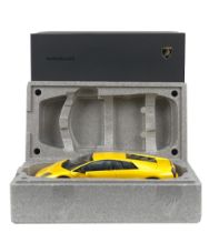 A boxed 1:12 scale die-cast model of a Lamborghini Murcielago by Autoart Signature,