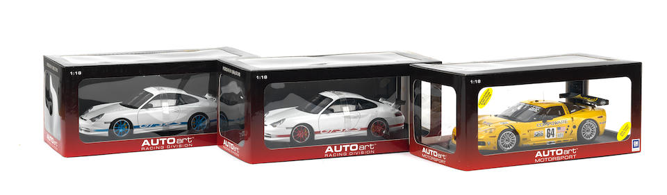 Three boxed 1:18 scale die-cast models by Autoart, ((3))