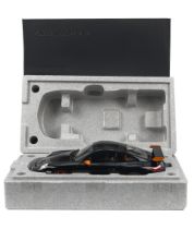 A boxed 1:12 scale die-cast model of a Porsche 911 (997) GT3 RS by Autoart Signature,