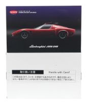 A boxed 1:12 scale die-cast model of a 1970 Lamborghini Jota SVR by Kyosho,