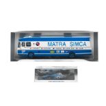 Two boxed 1:43 scale die-cast models of a 1970 Matra Simca race car transporter and a Matra Form...