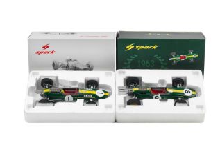 Two boxed 1:18 scale models of Jim Clark's 1963 and 1965 Grand Prix winning Lotus Formula 1 raci...