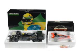 A boxed 1:12 scale limited edition model of Ayrton Senna's 1985 Lotus Renault 97T by Minichamps,...