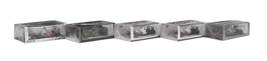 Five boxed 1:43 scale die-cast models of 2011-12 season Formula 1 race cars by Spark Models, (...