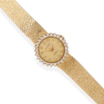 MOVADO: A 14K GOLD AND DIAMOND WRISTWATCH