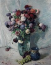 Fernand Toussaint (Belgian, 1873-1955) Nature morte au bouquet de chrysanth&#232;mes et raisin