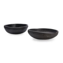 Two carved wood New Guinea bowls ht. 5 1/4, wd. 14, and ht. 5, wd. 13 3/4 in.