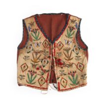 A Plains beaded cloth and hide vest ht. 22 1/2, wd. 18 1/2 in.