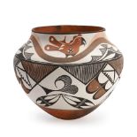 A Lolita Concho polychrome jar Lolita Torivio Concho, Acoma (1914-2000) ht. 9, wd. 9 in.